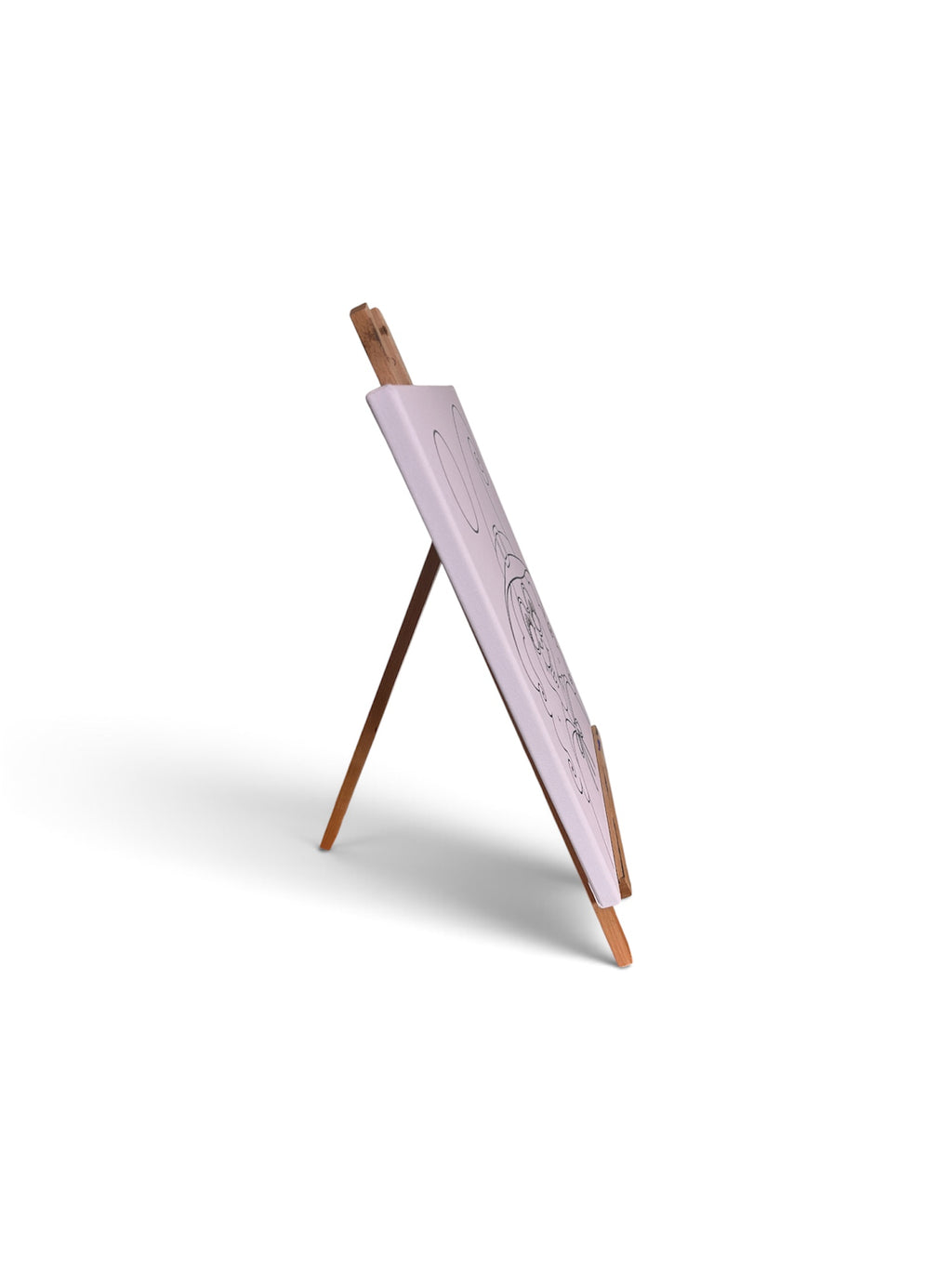 Side view showing the depth of a pre-traced canvas on a display easel; easel not included