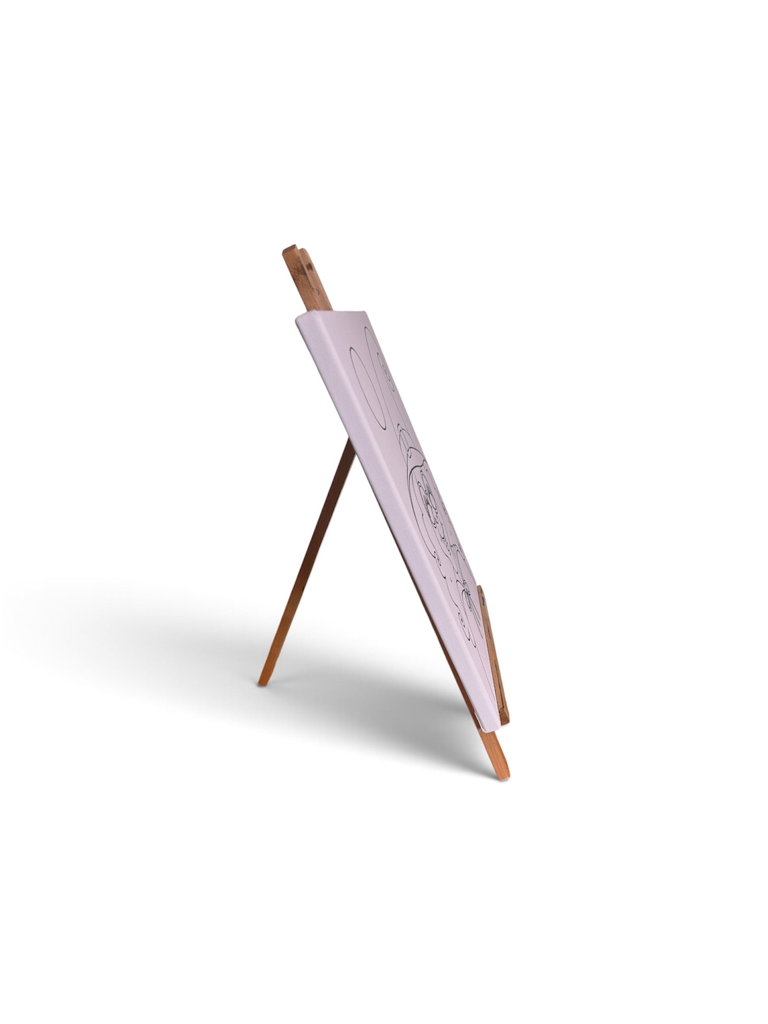 Side view showing the depth of a pre-traced canvas on a display easel; easel not included